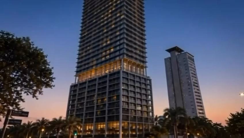 Luxury skyscraper hotel at dusk, Asunción