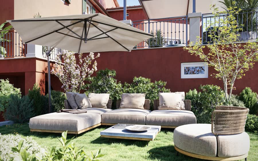 Garden lounge under a parasol